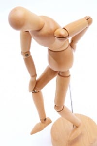 istock-back-pain-wooden-doll
